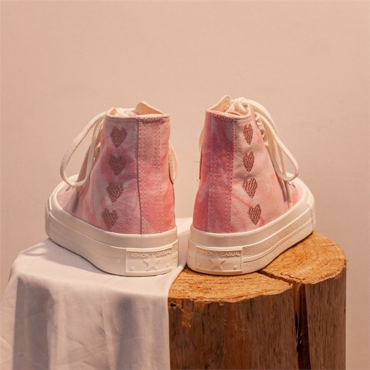Pink high cut fashion shoes
